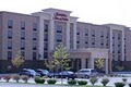 Hampton Inn & Suites Bloomington/Normal logo