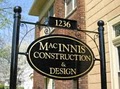 MacInnis Construction and Design, Corporation. logo