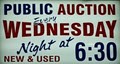 Port Huron Auction & Resale logo