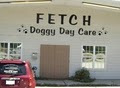 Fetch Doggy Day Care logo