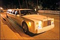 Touch of Class Limousines logo