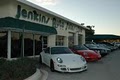 Auto Sales Jenkins Used Cars Randy Darlin Porsche Ferrari Lamborghini Corvette logo