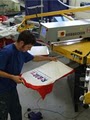 Miami T-shirt Screen Printing, Embroidery & Promotional Products by AndyG logo