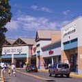 Tanger Outlet Center logo