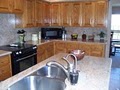 Budget Granite Countertops and Cabinet image 8