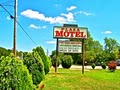 Plaza Motel logo