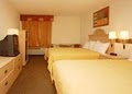 Quality Inn &  Suites logo