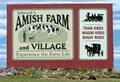 Schrock's Amish Farm and Village logo