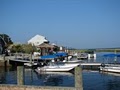 Snug Harbor Marina and Hotel logo