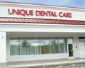 Unique Dental Center logo