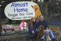 Almost Home Doggie Day Care logo