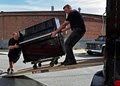 American Moving Co - Moving Company, Piano Movers logo