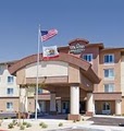 Country Inn & Suites by Carlson Barstow logo