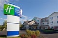 Holiday Inn Express and Suites Tilton NH logo
