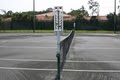 Naples Community Tennis Center logo