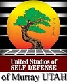 United Studios of Self Defense logo